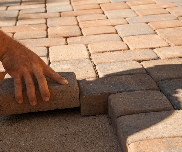 Pavers Getting Laid In The Front Yard Of A Suburban House